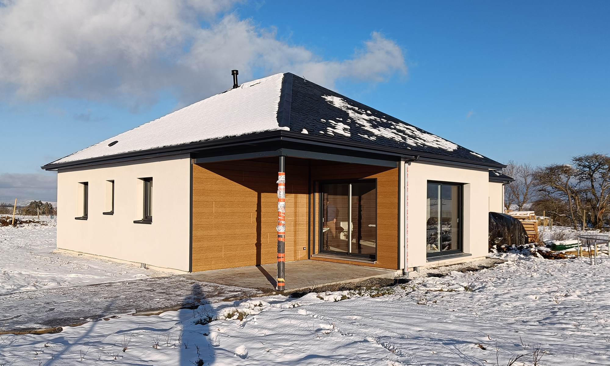 maison à ossature bois avec terrasse bien abritée